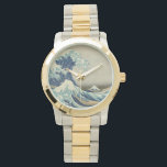 Den Underbara vågen av Kanagawa Armbandsur<br><div class="desc">Den Underbara vågen bevaka den Underbara vågen av Kanagawa, även känd som Underbara vågen eller helt enkelt vågen, är ett träblocksavtryck av den japanske konstnären Katsushika Hokusai. Som exempel på ukiyo-e-konst publicerades den mellan 1830 och 1833 som den första i Hokusais serie 36 vyer av Mount Fuji, och är hans...</div>