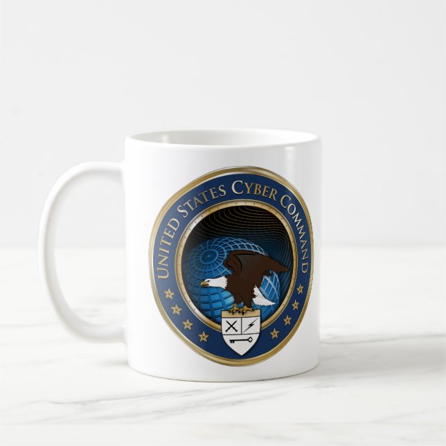 Den United States US cyberen befaller Kaffemugg (Vänster)