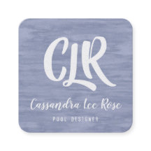 Den urblekta blåttmonogramen kvadrerar visitkorten