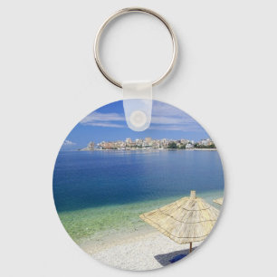 DEN URSNYGGA STRANDEN BESKÅDAR NYCKELRING