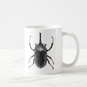 Den utskjutande designsvarten & vitkonst fodrar kaffemugg