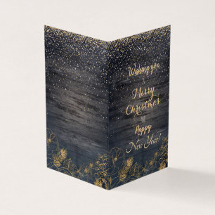 Den vackra julkonfekten och den gyllene blommigten kort