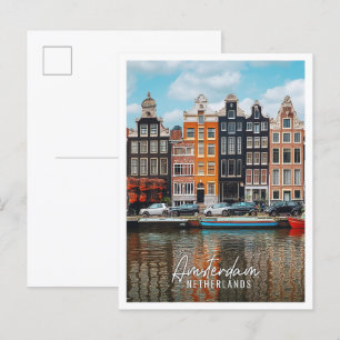 Den vackra turisten i Amsterdam i Nederländerna Vykort
