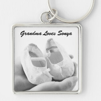 Den vaggade babyen skor fyrkantig silverfärgad nyckelring