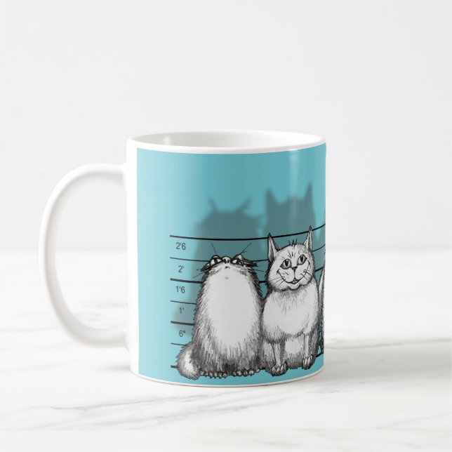 Den vanliga pussyen kaffemugg (Vänster)