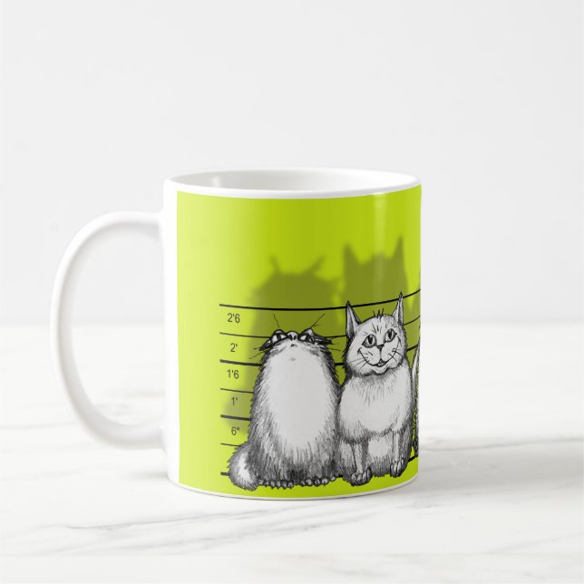 Den vanliga pussyen kaffemugg (Vänster)