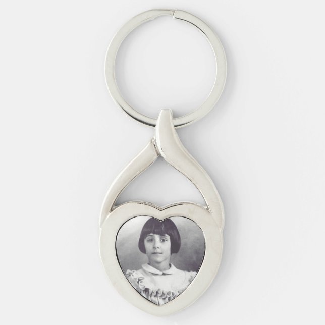 Den vördade Antonietta Meo Twisted Heart Silverfärgad Nyckelring (Framsidan)