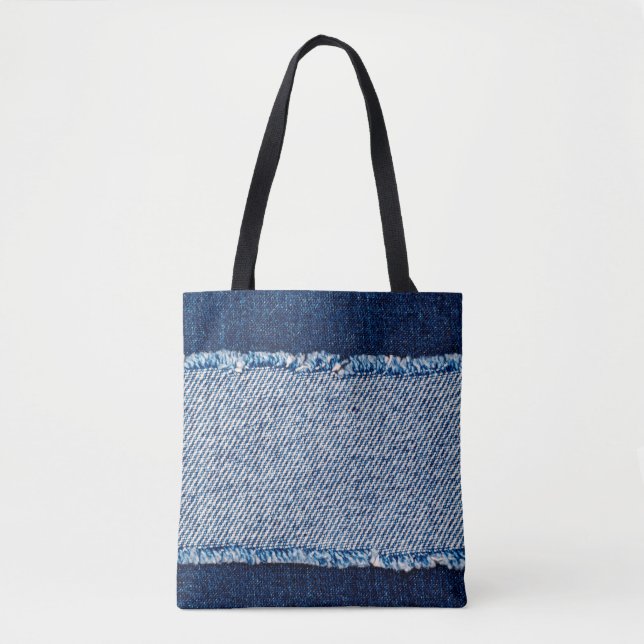 Denim blue jeans fabric frame. Bleached denim fabr Tygkasse (Framsida)
