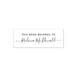 Denna bok tillhör handskrivet namn självfärgande stämpel