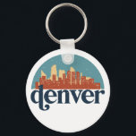Denver Colorado City Skyline Vintage Cityscape Nyckelring<br><div class="desc">Vintage- och reflexritorier med vackra skyliner, attraktion och cityscape-konst. Coola skyscraper och byggnad silhuette illustrerar handelsvara för turister och resenärer. Perfekt som souvenir att ta med sig hem när man reser värld runt. Spara minnet av din resa och semester med familj och vänner. Bakgrunden till färg kan anpassas till färg....</div>