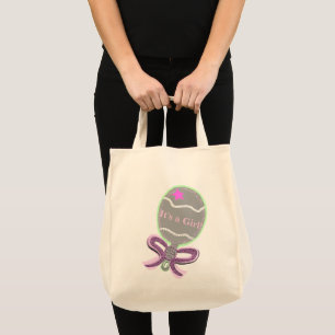 Det är en Rosa Baby Rattle Tote Bag Tygkasse