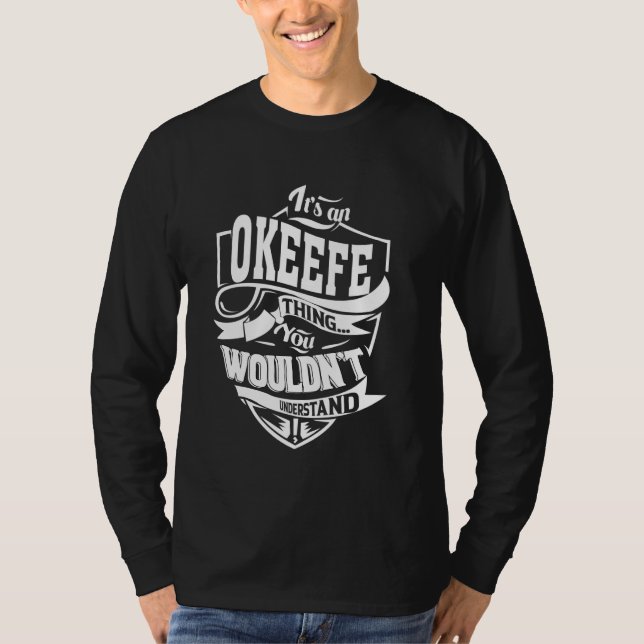 Det är ett OKEEFE Sak-gåvor T Shirt (Framsida)