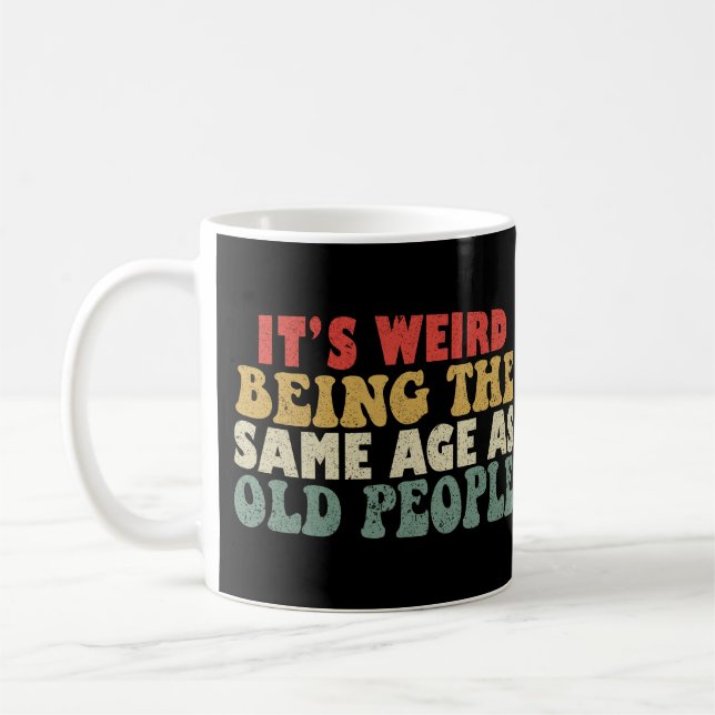Det är Konstig att vara lika gammal som äldre Kaffemugg (Vänster)