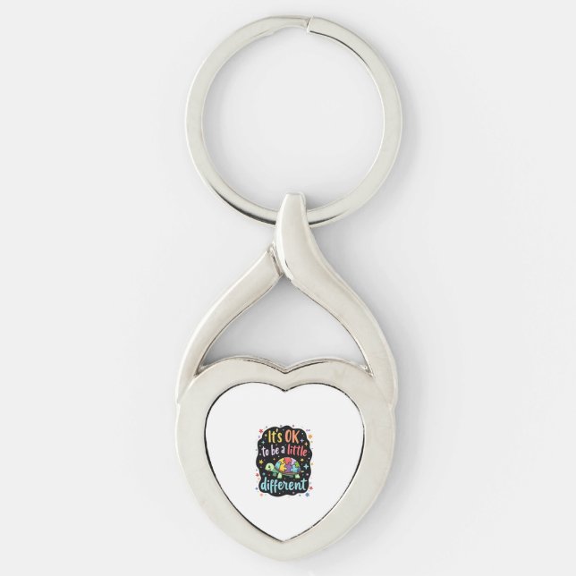 Det är okej att vara lite annorlunda. twisted heart silverfärgad nyckelring (Framsidan)