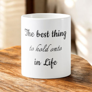 Det bästa att hålla sig fast vid i livet är varand kaffemugg