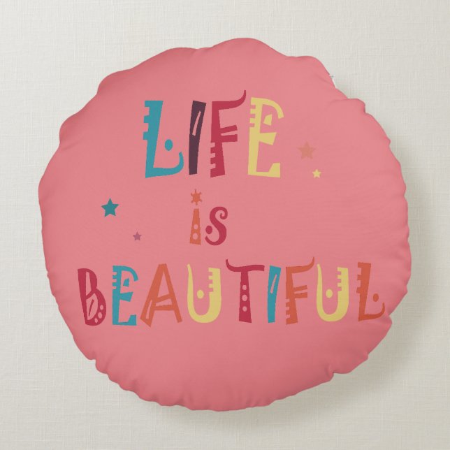 Det färgstarka textlivet är vackert och stjärnorna rund kudde (Baksidan)