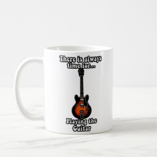 Det finns alltid tid att spela gitarren. kaffemugg (Vänster)