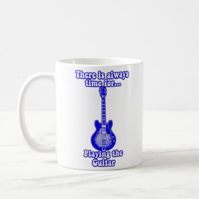 Det finns alltid tid att spela gitarren. kaffemugg (Vänster)