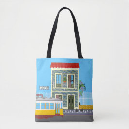 Det gamla huset med katter och gult tygkasse