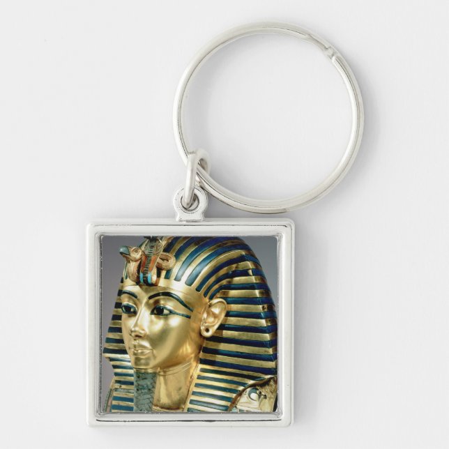 Det guld- begravnings- maskerar, från graven av fyrkantig silverfärgad nyckelring (Framsidan)