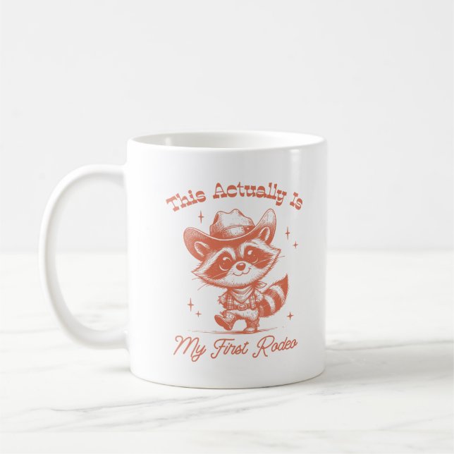 Det här är min första Rodeo Raccoon Cowboy Kaffemugg (Vänster)