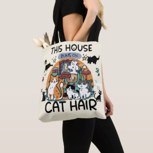Det här huset drivs på kattmankvalster humor tygkasse