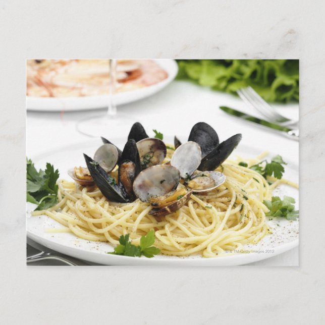 Det italienska cuisineet. Spaghetti alle vongole. Vykort (Framsida)