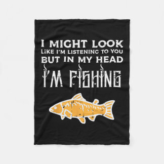 Det kan se ut som att lyssna på Fisket... Angler M Fleecefilt