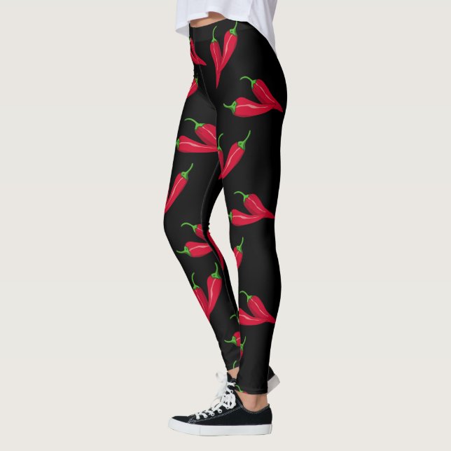 Det kryddiga röda chilimönster, peppar på svarten, leggings (Vänster)