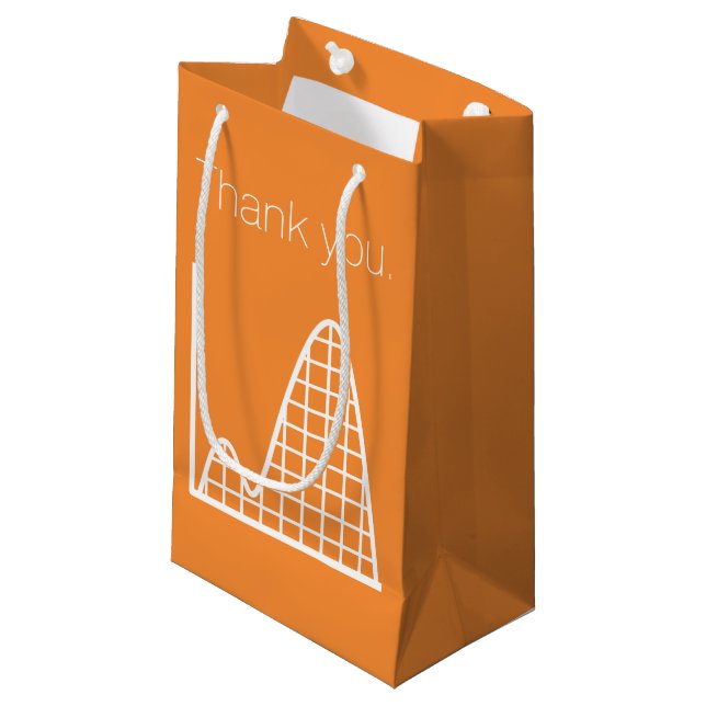 Det Lägger Till Sig i Orange Presentpåse (Framsidan Vinklad)