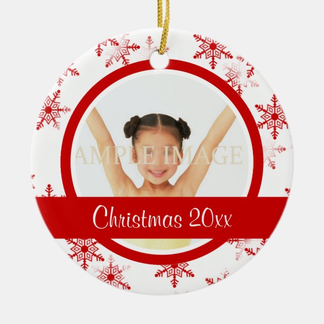 Det röda vitsnowflakefotoet personifierar julgransprydnad keramik (Framsidan)