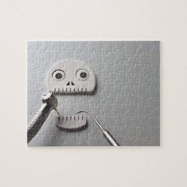 Det skelett som tandbehandling sker med pussel (Horisontell)