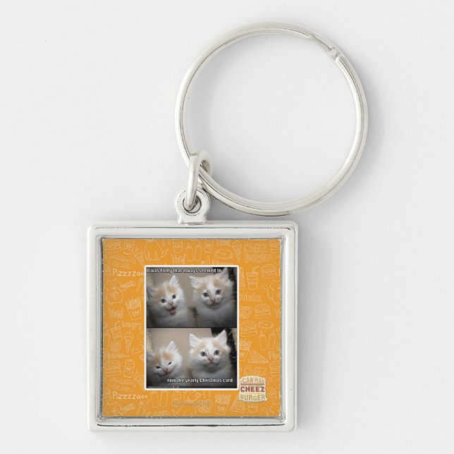 Det var fluffigt fyrkantig silverfärgad nyckelring (Framsidan)