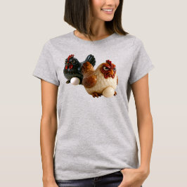 Deus poules couvent sur un tee-shirt. t shirt