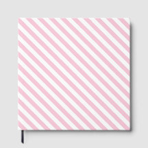 Diagonalt vitt och rosa randmönster