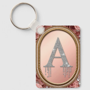 Diamantbokstav A-monogram i guldbord med rosa  Nyckelring