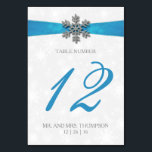 Diamante Snowflake & Blue Ribbon Winter Wedding Bordsnummer<br><div class="desc">Röntsnöflingan och blåraket bröllop är perfekt för alla par som planerar ett romantiskt vinterbröllop firande. Utformningen har en lätt silvud-grått och en vit snöflingor med en romante-snöflake ovanpå ett silkesaktigt tittar band. Ordalydelsen innehåller samma grått- och blått färg av formgivningen och kan lätt användas som personlig för att passa din...</div>