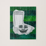 Din Borttappad Sock Jigszle Puzzle Pussel<br><div class="desc">En lustig penna teckning över kollage bakgrund,  med en lustig maniakal leende strumpa över grönt och teal.</div>