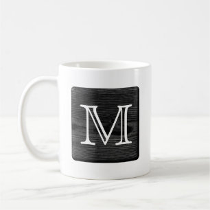 Din brevMonogram. Bild av svart trä Kaffemugg
