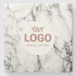 din logotyp på vit marmor stenunderlägg