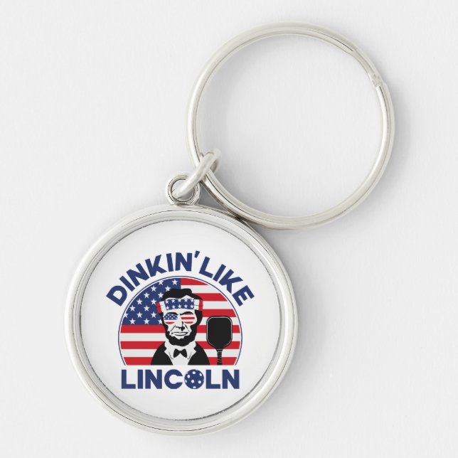 Dinkin som Lincoln Rund Silverfärgad Nyckelring (Framsidan)