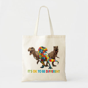 Dinosaur Autism Awareness-design har en dinosa Tygkasse