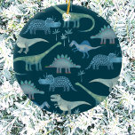Dinosaur Cute Julgransprydnad Keramik<br><div class="desc">Många blå dinosaurier,  Tyrannosaurus rex,  Spinosaurus,  Stegosaurus,  Diplodocus och Triceratops på teal grönt bakgrund. Perfekt för paleontologer. Originalkonst av Nic Squirrell.</div>