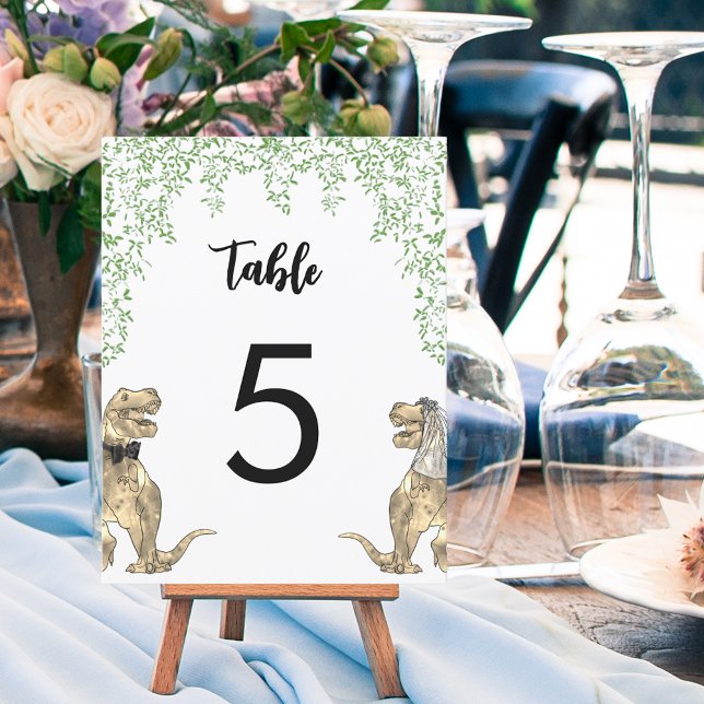 Dinosaur Theme Bröllop Anpassningsbar Bordsnummer (Dinosaur themed wedding table numbers with T-Rex bride and groom and jungle foliage)