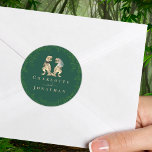Dinosaur Wedding Green Custom Runt Klistermärke<br><div class="desc">Bring a roar of fun to your celebration with these dinosaur-themed wedding stickers! Featuring an adorable T-Rex bride and groom surrounded by elegant watercolor botanical greenery, these dark green stickers are the perfect for a whimsical wedding reception, rehearsal dinner, or dino-themed celebration. With modern script typography and customizable templates, you...</div>