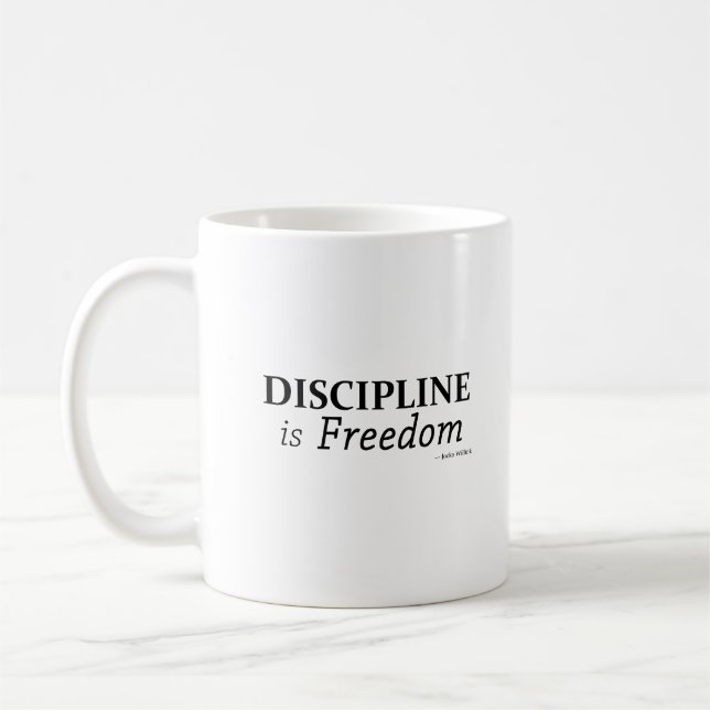 Disciplin är frihet  kaffemugg (Vänster)