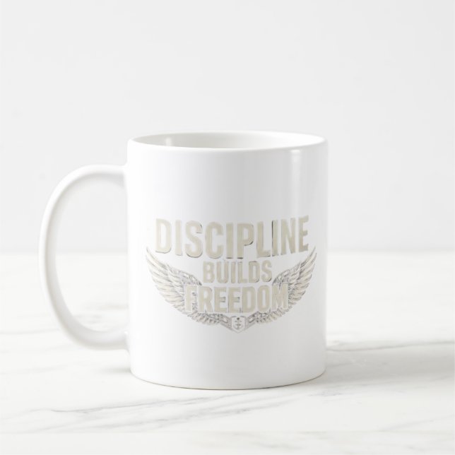 DISCIPLIN BYGGER FRIHET KAFFEMUGG (Vänster)
