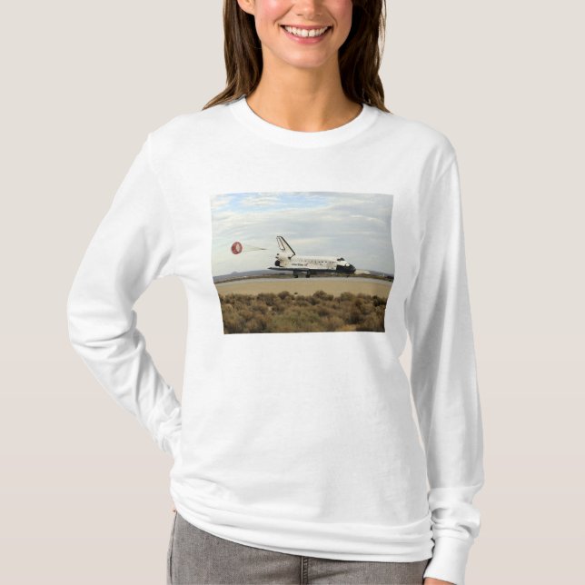 Discovery för utrymmesförskjutning distribuerar de tee shirt (Framsida)