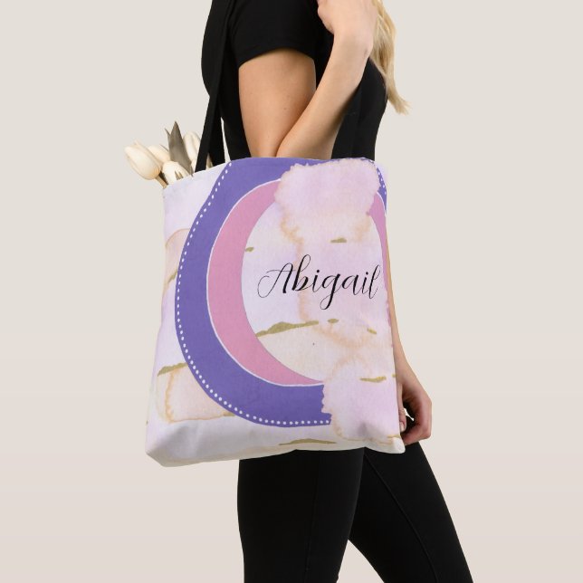 Ditt namn. Abstrakt vattenfärgsmoln rosa, guld Tygkasse (Närbild)