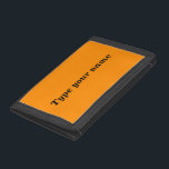 Ditt namn på Orange Färg Trifold Nylon Wallet<br><div class="desc">Tittar du för plånbok? Föredrar du också enkel design och vanlig färg? Se denna svarta, oformaterade text på orange färg-bakgrunden med den svarta kant-designen trefaldig nylonplånbok. Du kanske gillar det. Det är också anpassadet. Du kan sätta ditt namn på det. Kontrollera utseendet när du har skrivit ditt namn. Om utseendet...</div>